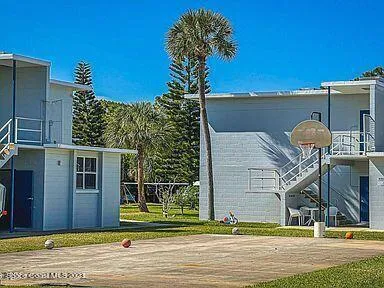a view of a house with a iron stairs