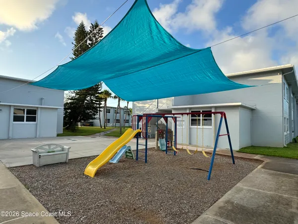 a view of a hall with a slide