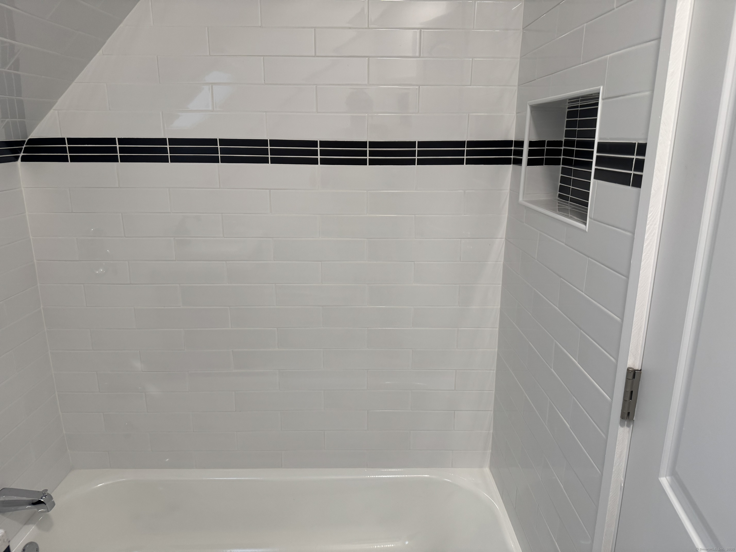 263 Hawley Avenue Bridgeport, CT 06606 - Photo 10 of 19 a close up of a bathtub