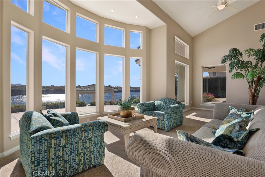 7645 Rio Vista Drive Big River, CA 92242 - Photo 19 of 56 a living room with furniture and a large window