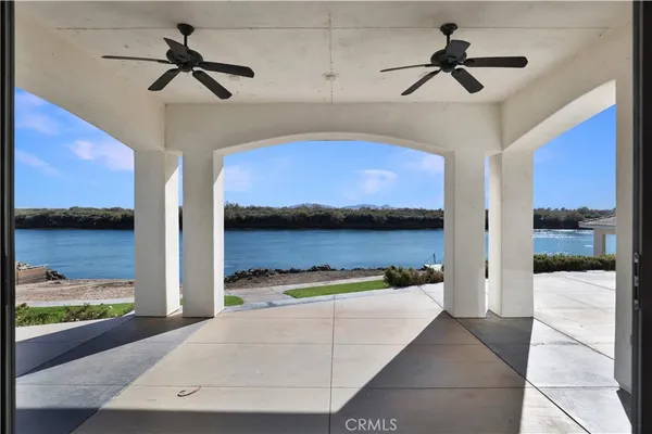 a view of a lake with sunset