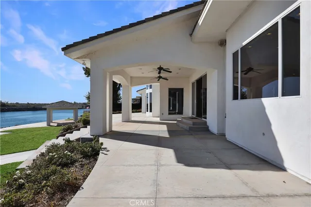 a bathroom with a double vanity sink mirror and shower