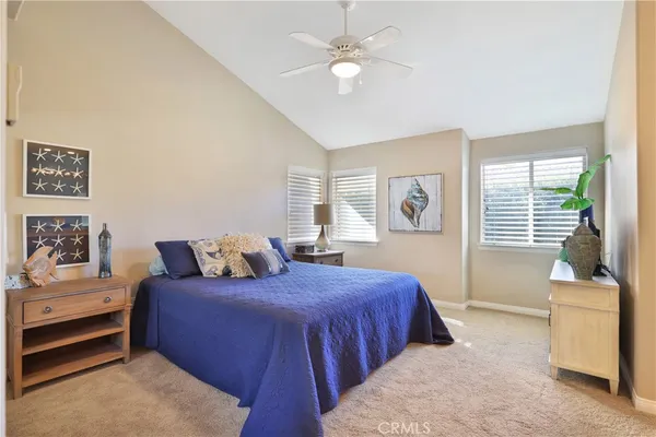 a bathroom with a granite countertop sink mirror and shower