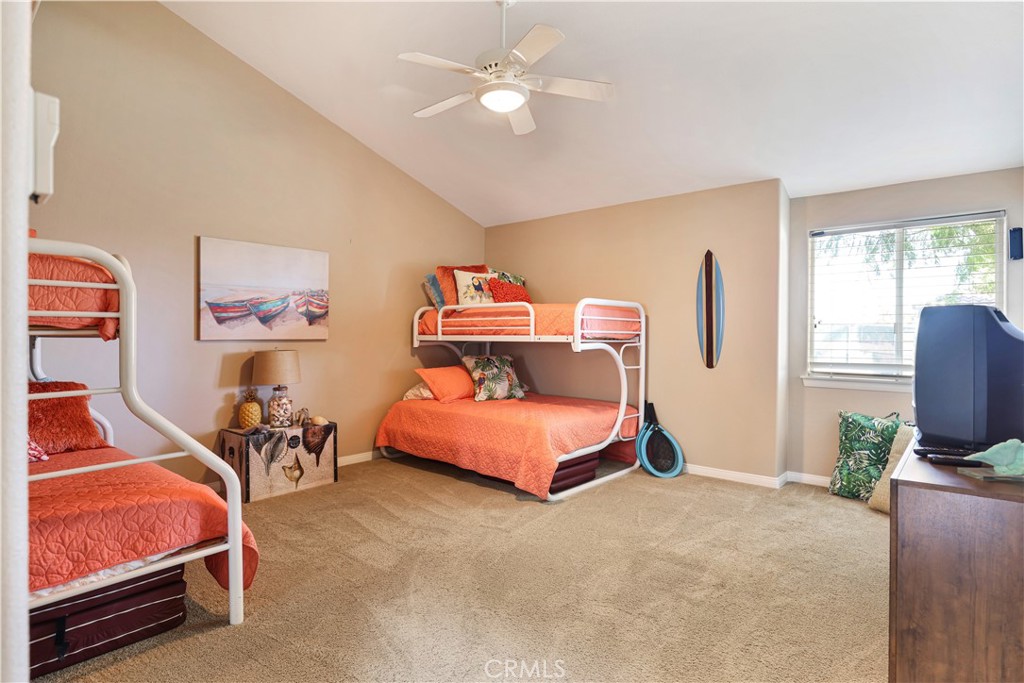 7645 Rio Vista Drive Big River, CA 92242 - Photo 43 of 56 a bedroom with furniture and a chandelier