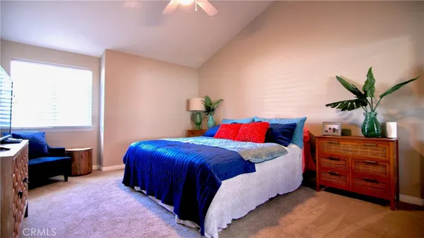 a view of white house with a yard