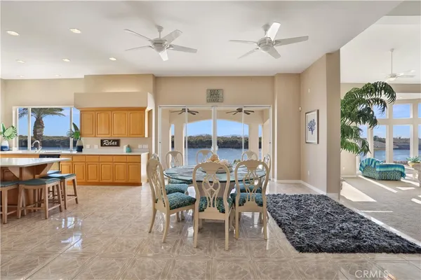 a large kitchen with lots of counter space and window
