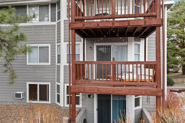 a view of a house with a window and wooden floor