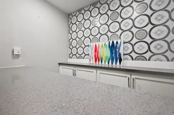 a view of a sink and a bench