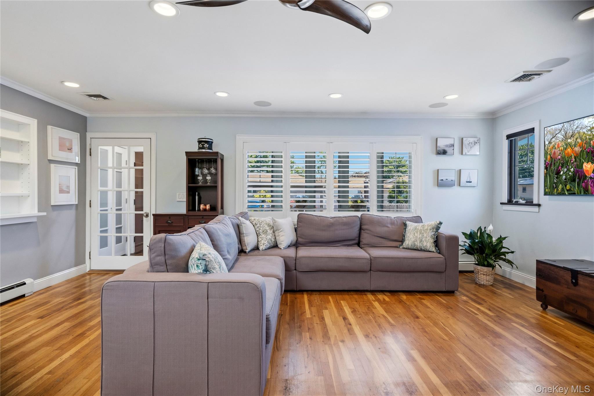 190 Sexton Road West Babylon, NY 11704 - Photo 8 of 28 a living room with furniture and a large window