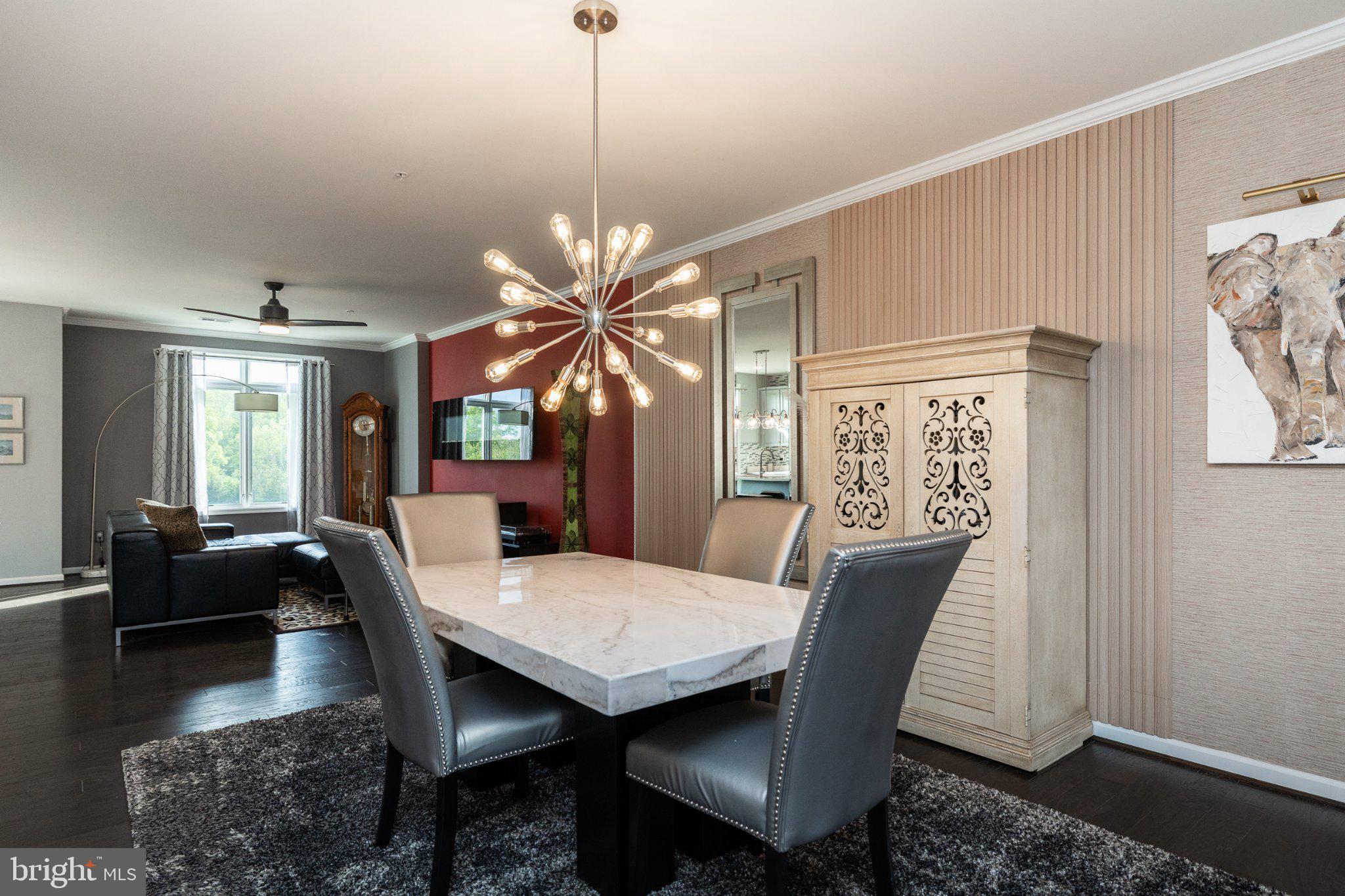 1414 Ribbon Limestone Terrace Southeast, Unit E204 Leesburg, VA 20175 - Photo 21 of 49 Modern elegance in a stylish dining space.