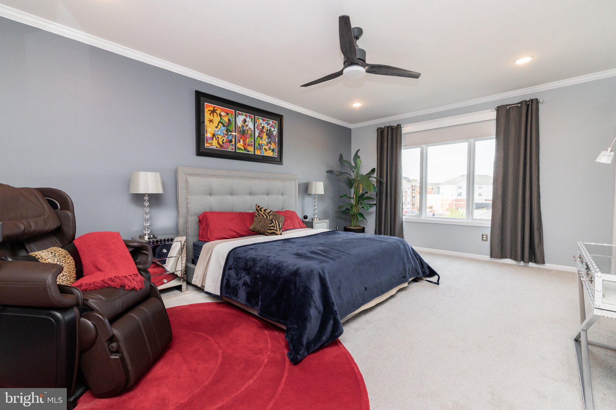 1414 Ribbon Limestone Terrace Southeast, Unit E204 Leesburg, VA 20175 - Photo 25 of 49 Serene bedroom with modern flair.