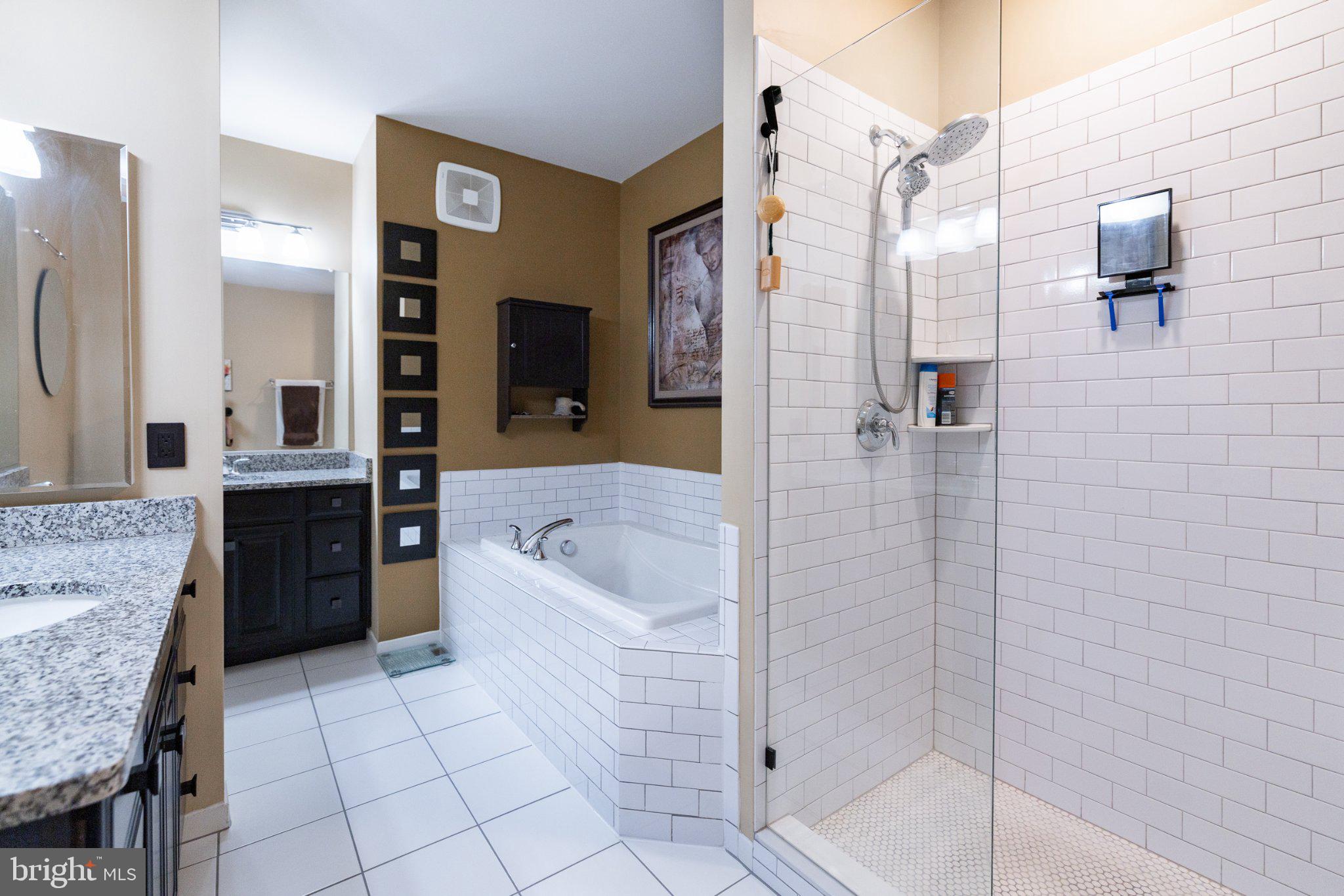 1414 Ribbon Limestone Terrace Southeast, Unit E204 Leesburg, VA 20175 - Photo 29 of 49 Elegant bathroom with modern finishes.