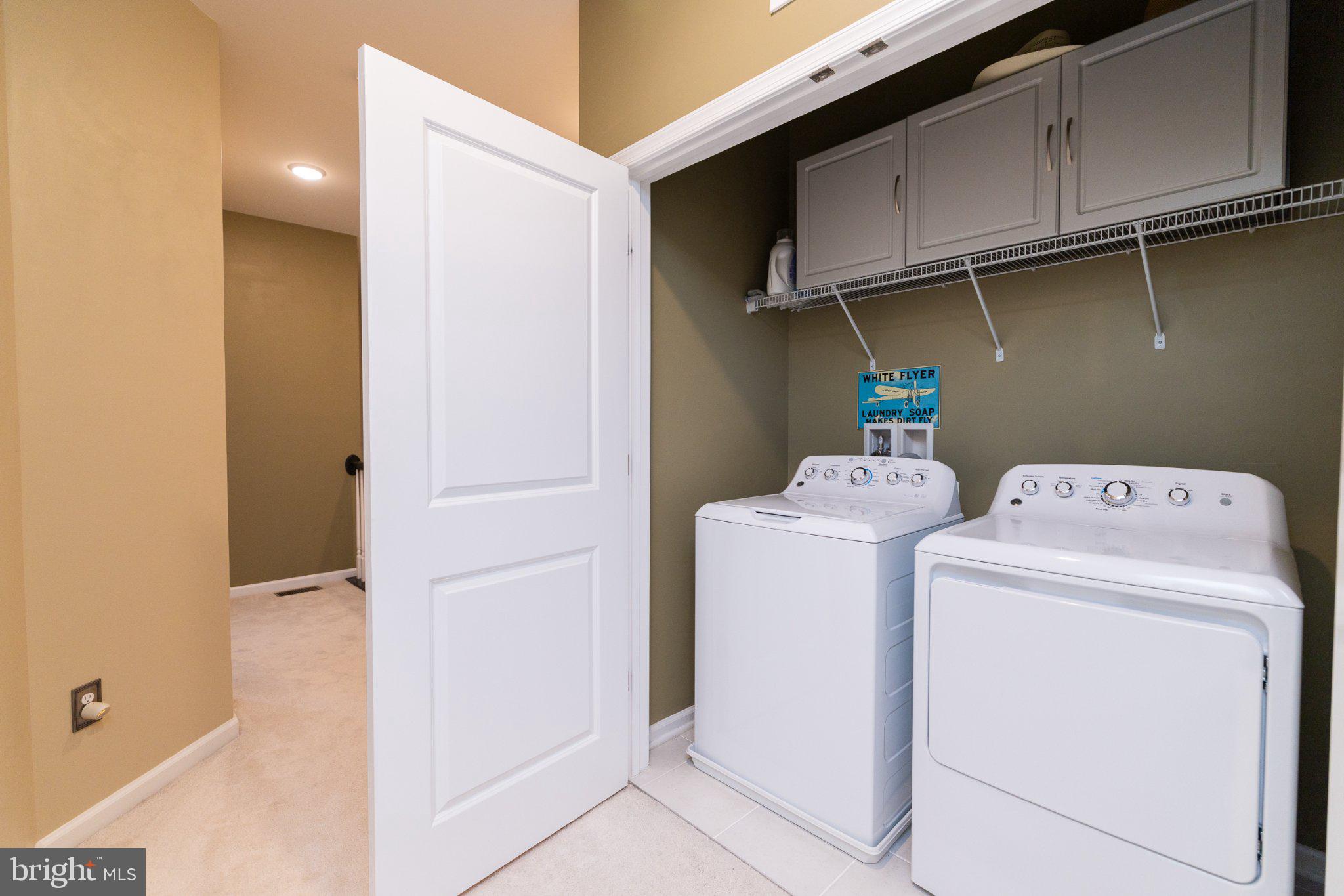 1414 Ribbon Limestone Terrace Southeast, Unit E204 Leesburg, VA 20175 - Photo 35 of 49 Bright and functional laundry space.