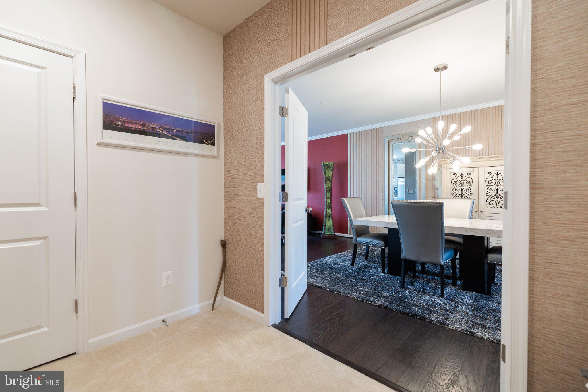 1414 Ribbon Limestone Terrace Southeast, Unit E204 Leesburg, VA 20175 - Photo 41 of 49 Elegant entryway to a stylish dining area.