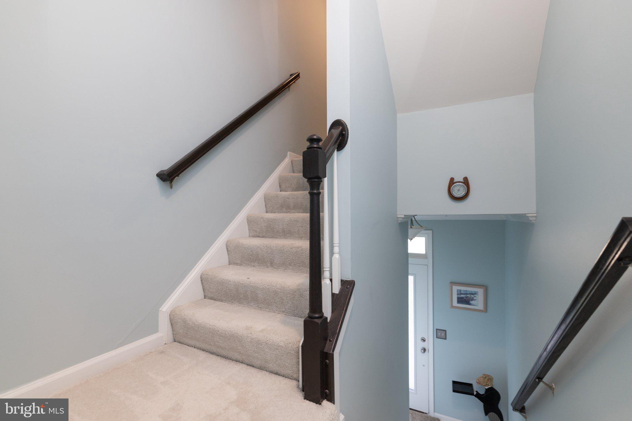 1414 Ribbon Limestone Terrace Southeast, Unit E204 Leesburg, VA 20175 - Photo 42 of 49 Inviting staircase with soft hues.