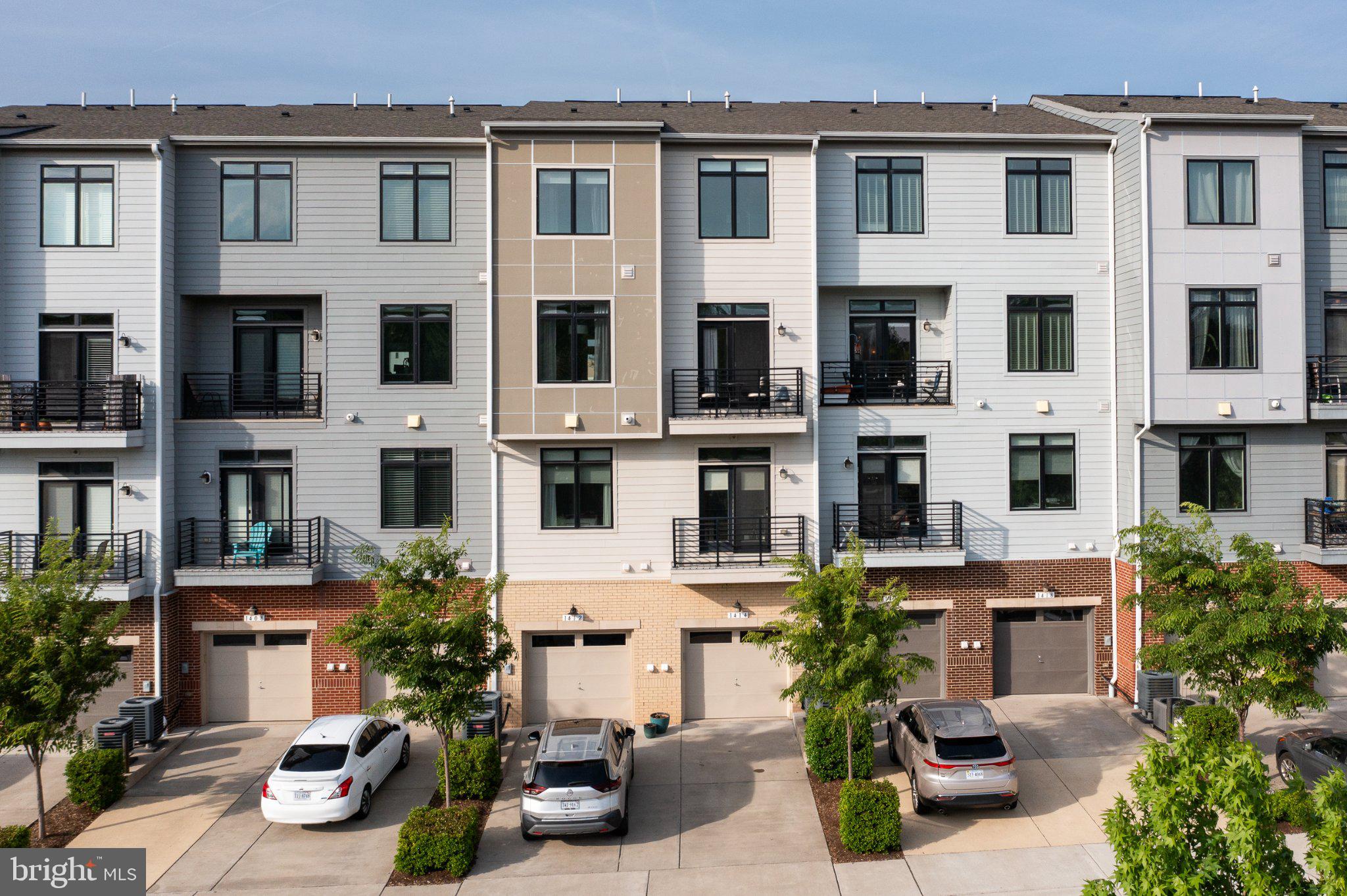 1414 Ribbon Limestone Terrace Southeast, Unit E204 Leesburg, VA 20175 - Photo 45 of 49 Modern townhomes with stylish facades.