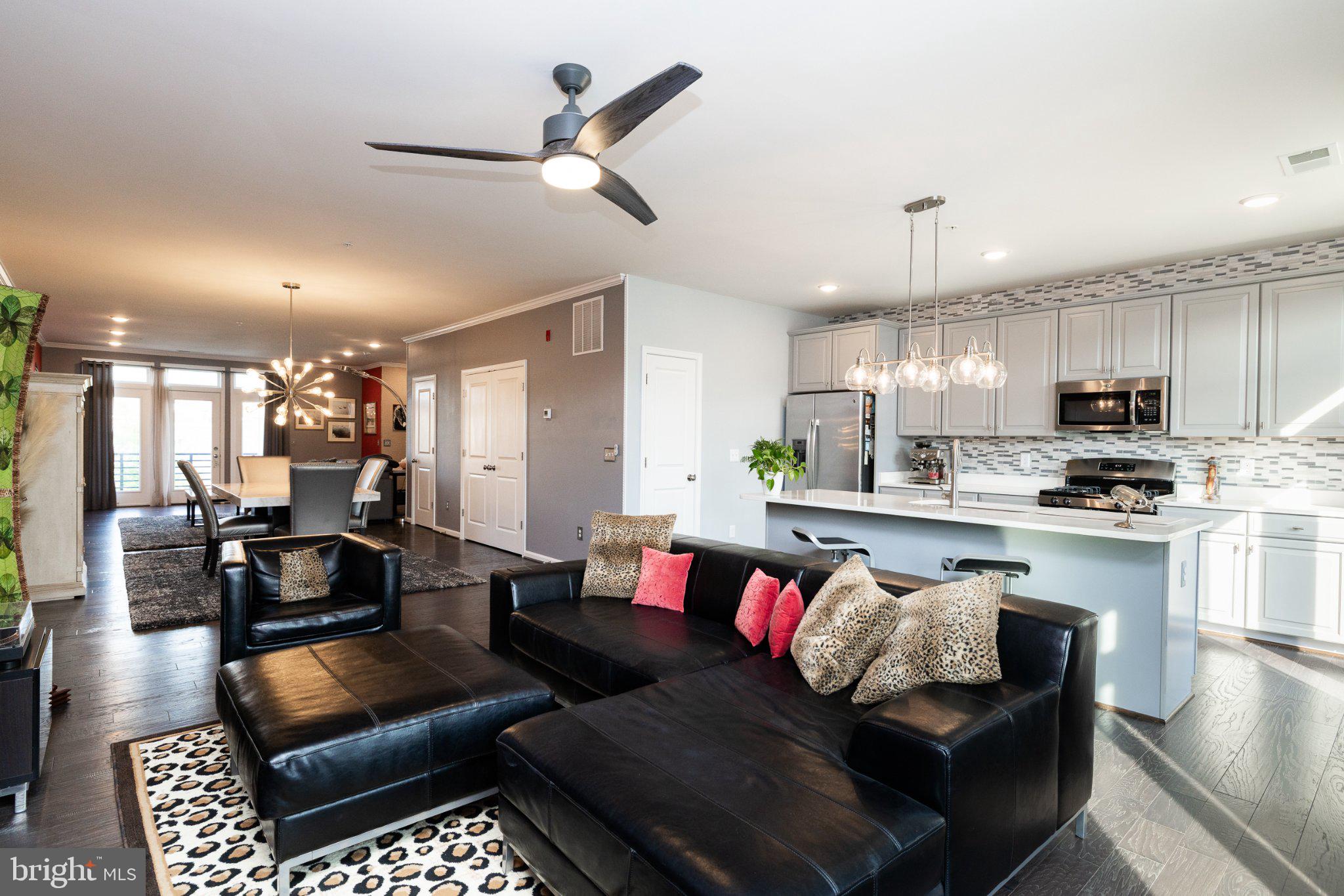 1414 Ribbon Limestone Terrace Southeast, Unit E204 Leesburg, VA 20175 - Photo 10 of 49 Modern elegance in open living space.