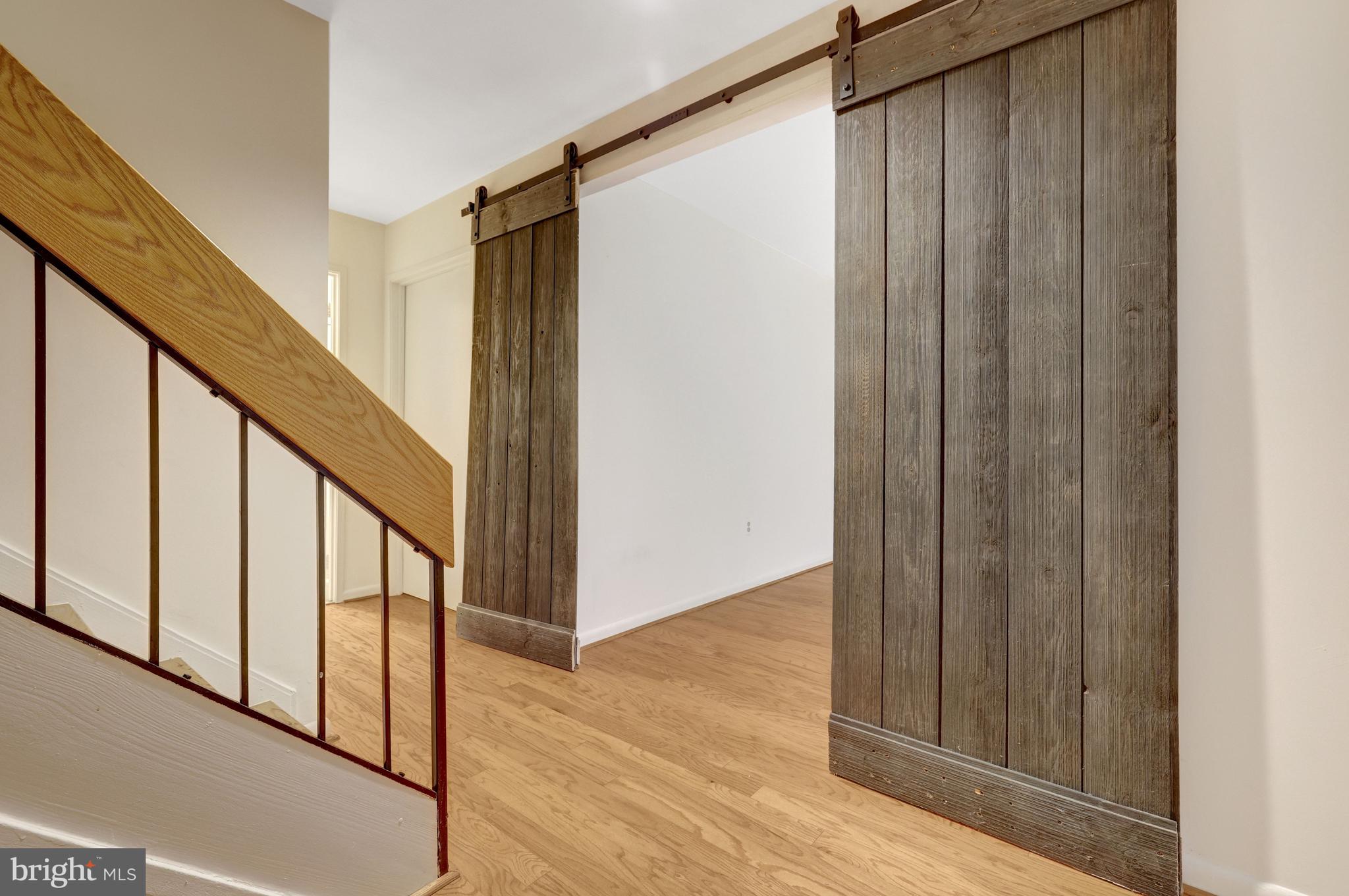 1752 Wainwright Drive Reston, VA 20190 - Photo 35 of 51 Barn doors on Family Room