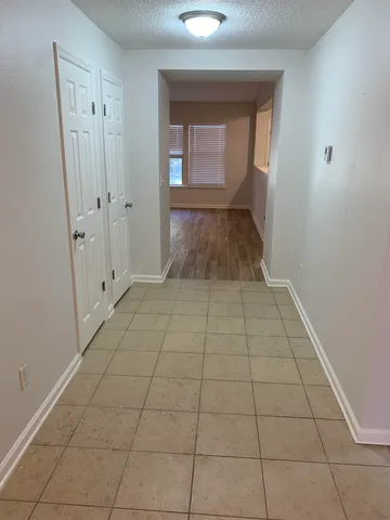 an empty room with a natural light