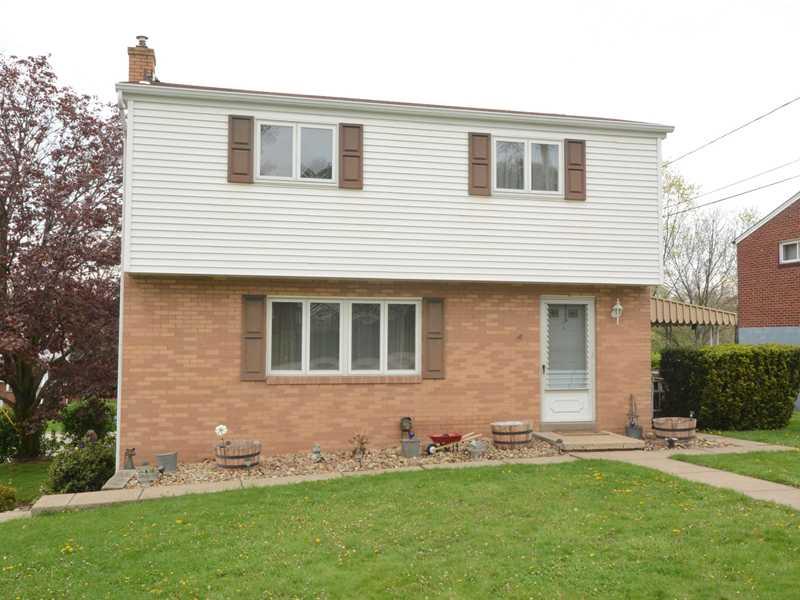 Exterior Front. This 3 bedroom, 1.5-bath Colonial is located on the no-thruway end of Cathell Road and occupies a flat, corner lot.  Plentiful updates have been made to the home, both inside and out!