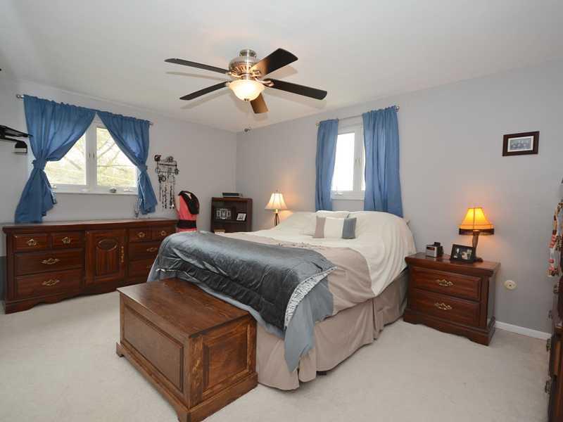 1305 Cathell Road Baldwin, PA 15236 - Photo 14 of 23 Master Bedroom. The master bedroom is outfitted with neutrally toned walls and wall-to-wall carpeting, ceiling fan, and two windows overlooking the rear and side of the property.