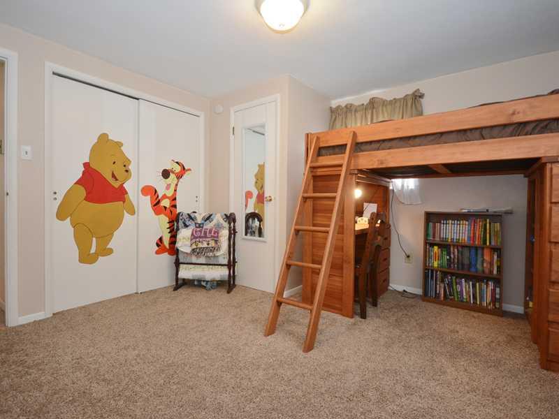 1305 Cathell Road Baldwin, PA 15236 - Photo 17 of 23 Bedroom. Bedroom three has two closets. The window behind the loft bed overlooks the side yard.