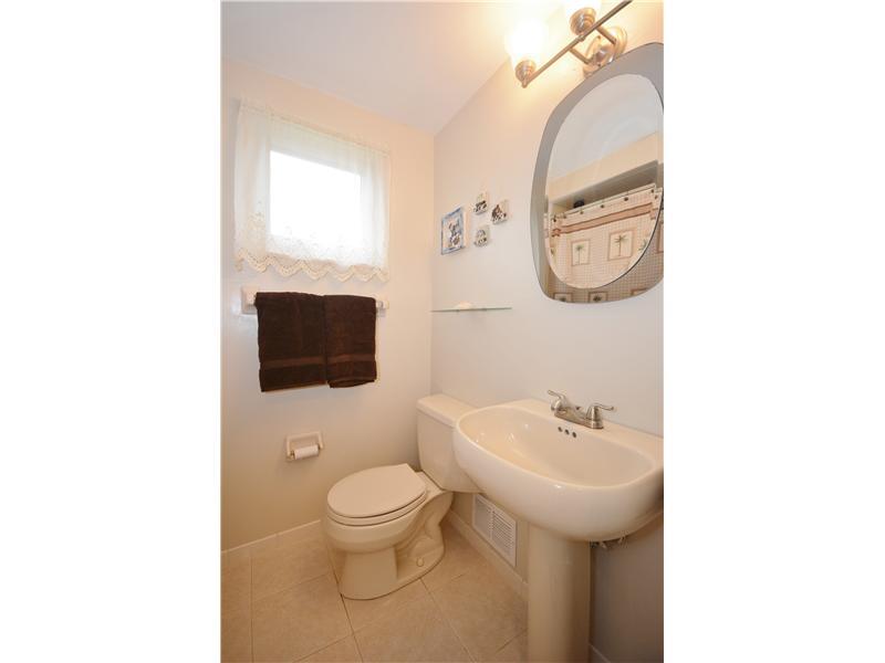 1305 Cathell Road Baldwin, PA 15236 - Photo 18 of 23 Full Bath. The full bath offers ceramic tile floor, combination tub and shower, and pedestal sink.