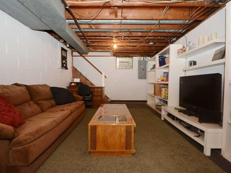 1305 Cathell Road Baldwin, PA 15236 - Photo 19 of 23 Basement/Game Room. The partially finished lower level is used as a gameroom. The room has abundant built-in storage.