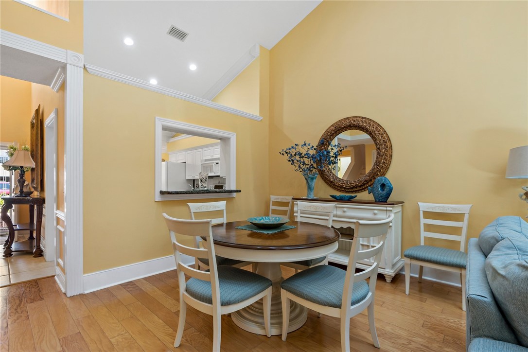 470 9th Place Vero Beach, FL 32960 - Photo 8 of 28 a view of a dining room with furniture and wooden floor
