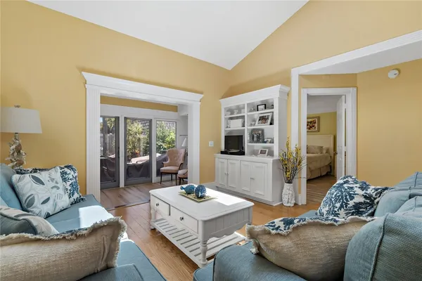 a living room with furniture and a table