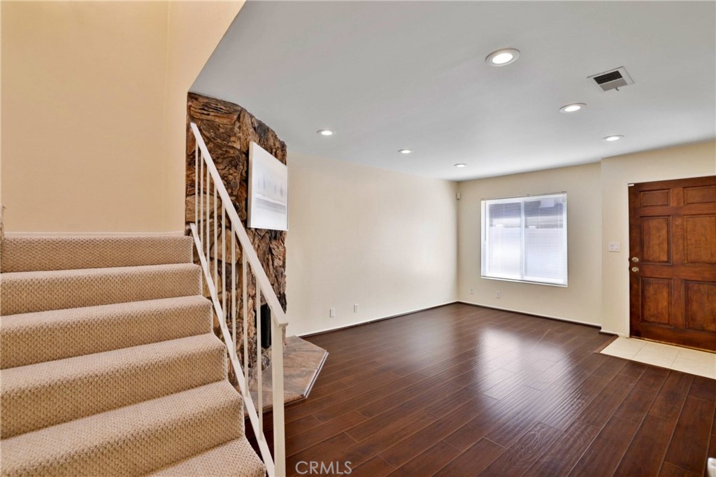 11557 Lower Azusa Road, Unit D El Monte, CA 91732 - Photo 18 of 38 a view of an entryway with wooden floor