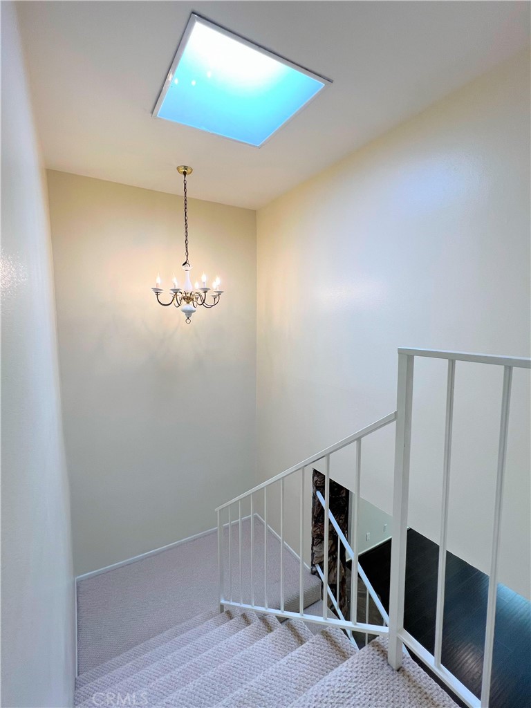 11557 Lower Azusa Road, Unit D El Monte, CA 91732 - Photo 19 of 38 a view of entryway and hall with wooden floor