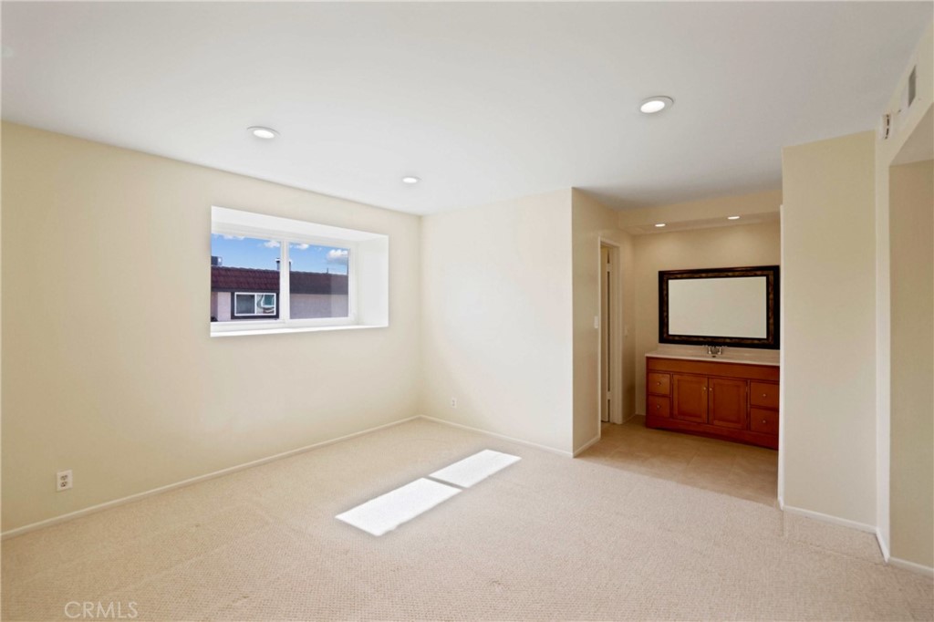 11557 Lower Azusa Road, Unit D El Monte, CA 91732 - Photo 22 of 38 an empty room with a bathroom