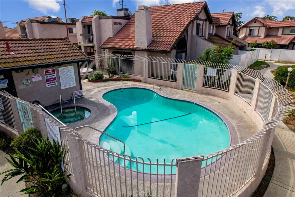 11557 Lower Azusa Road, Unit D El Monte, CA 91732 - Photo 33 of 38 a view of a house with backyard and sitting area
