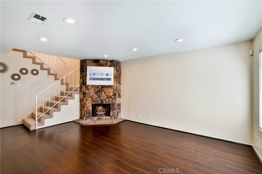 11557 Lower Azusa Road, Unit D El Monte, CA 91732 - Photo 8 of 38 an empty room with wooden floor