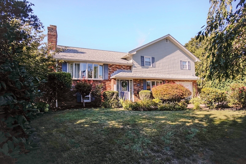 63 Wing Road Acushnet, MA 02743 - Photo 1 of 26 a front view of a house with a yard