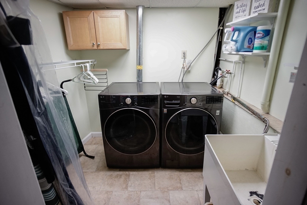 63 Wing Road Acushnet, MA 02743 - Photo 15 of 26 a utility room with dryer and washer