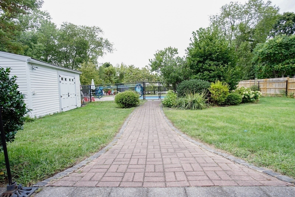 63 Wing Road Acushnet, MA 02743 - Photo 18 of 26 a view of a back yard of the house