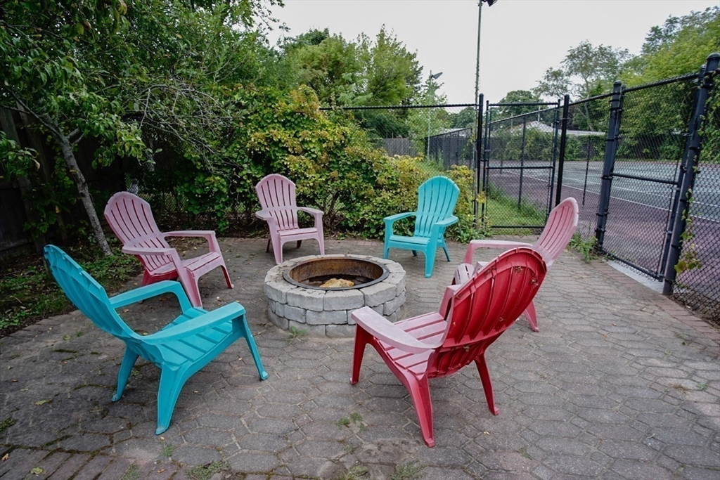 63 Wing Road Acushnet, MA 02743 - Photo 20 of 26 a view of a backyard with furniture and outdoor