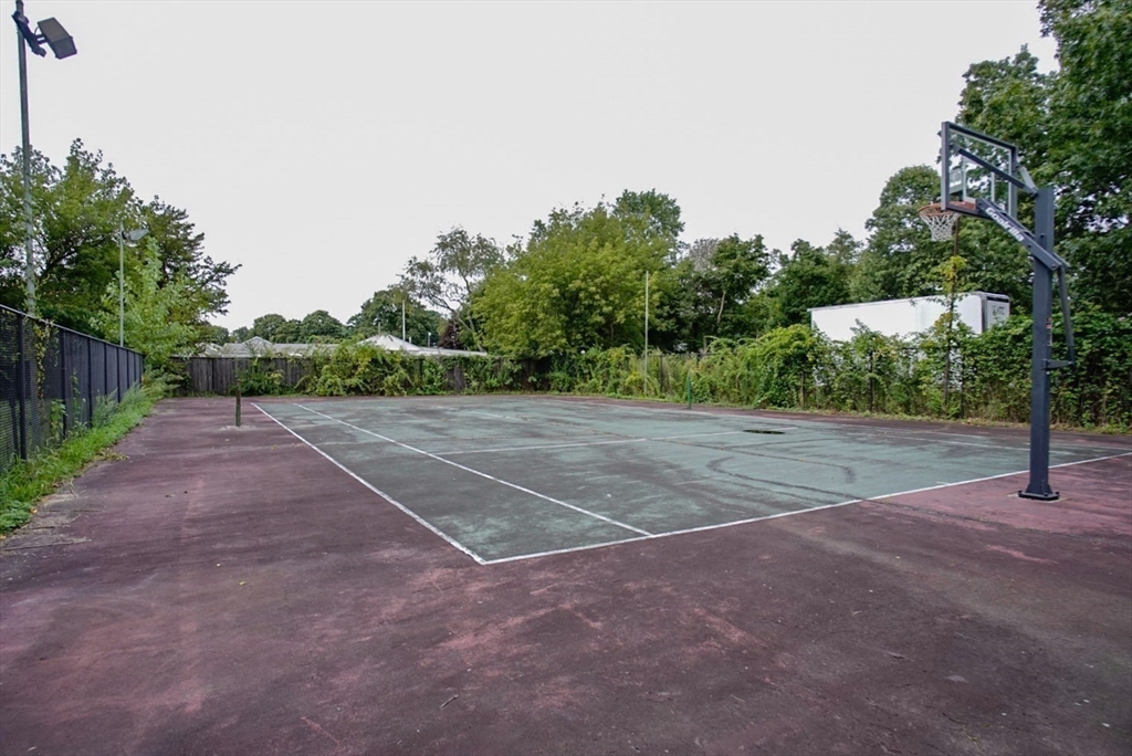 63 Wing Road Acushnet, MA 02743 - Photo 21 of 26 a view of a yard with a trees