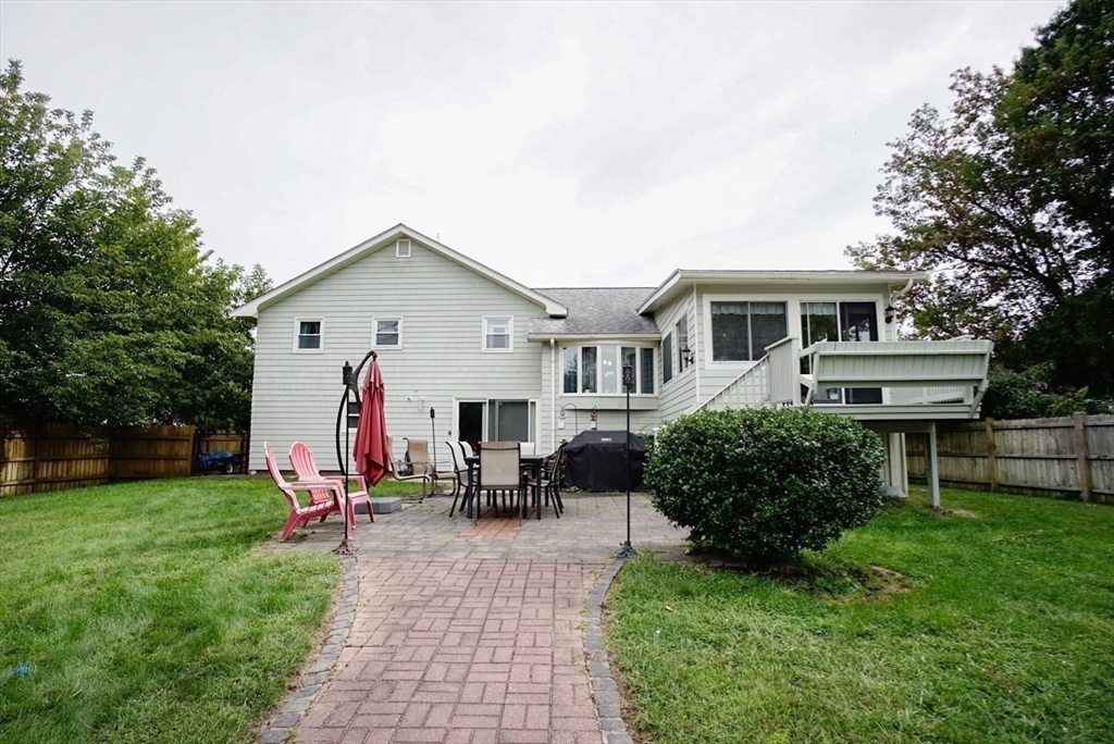 63 Wing Road Acushnet, MA 02743 - Photo 23 of 26 a front view of house with yard and green space