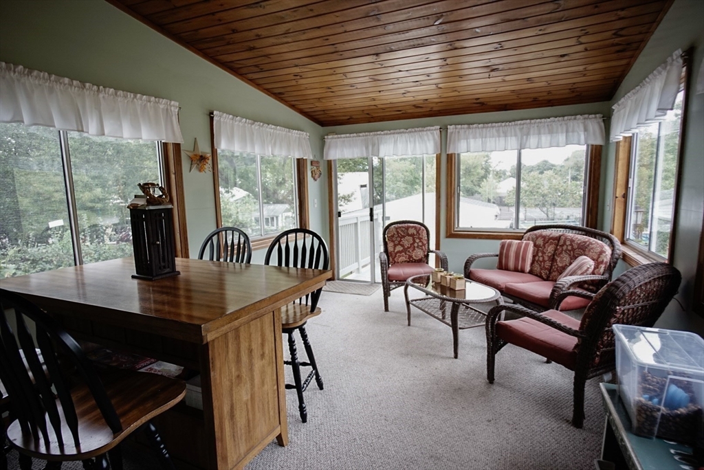 63 Wing Road Acushnet, MA 02743 - Photo 6 of 26 a view of a livingroom with furniture and a window