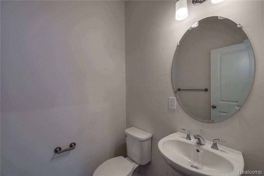51056 Rockingham Drive Canton, MI 48188 - Photo 17 of 23 halfbath.jpg
