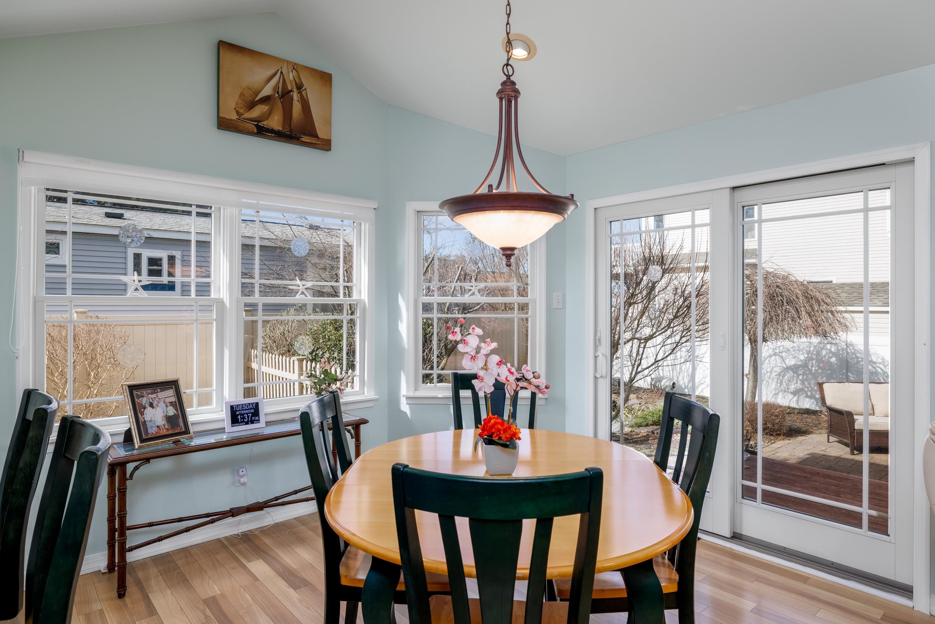 5 Adelphia Road Cape May, NJ 08204 - Photo 12 of 48 a view of a dining room with furniture large windows and wooden floor