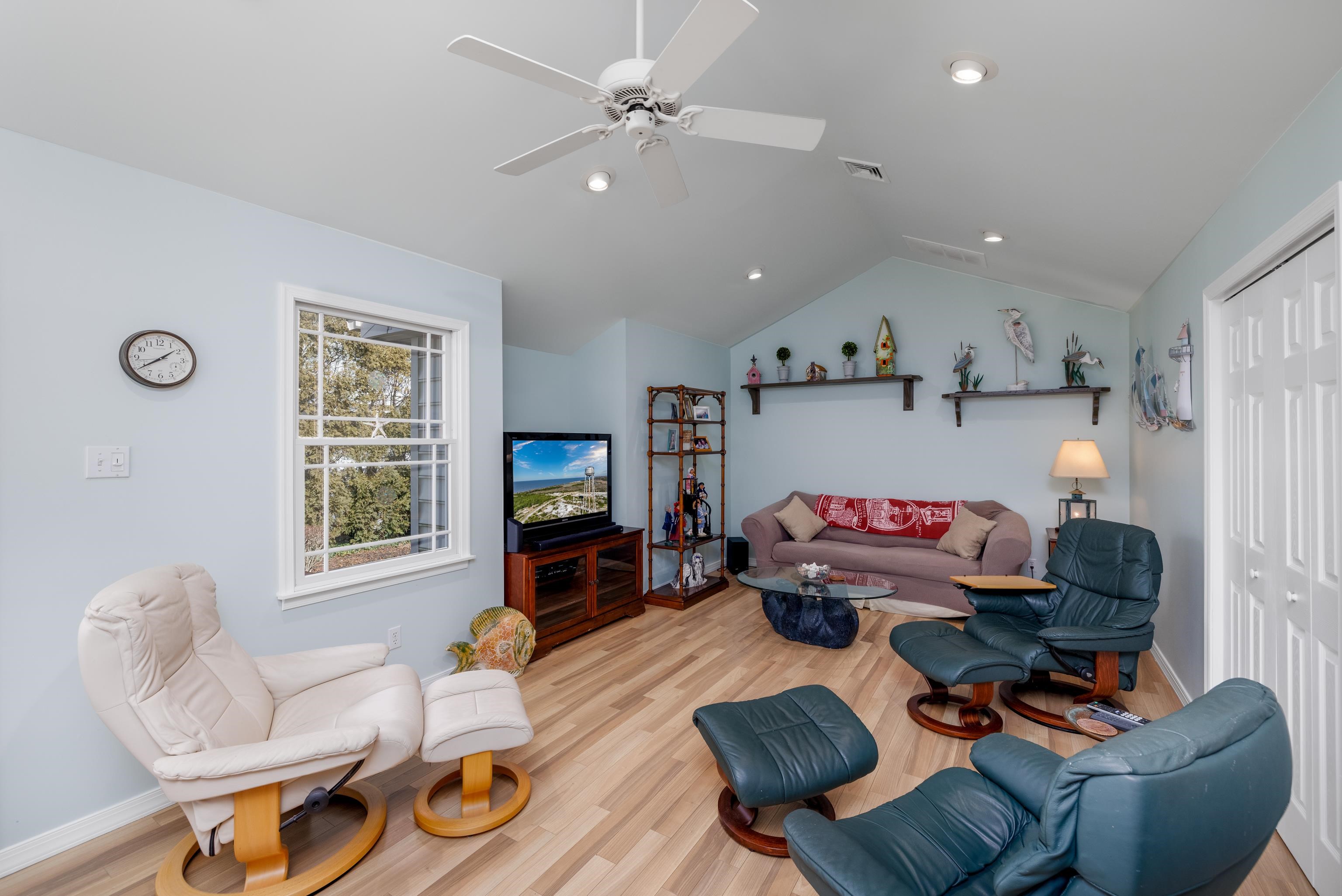 5 Adelphia Road Cape May, NJ 08204 - Photo 14 of 48 a living room with furniture and a flat screen tv