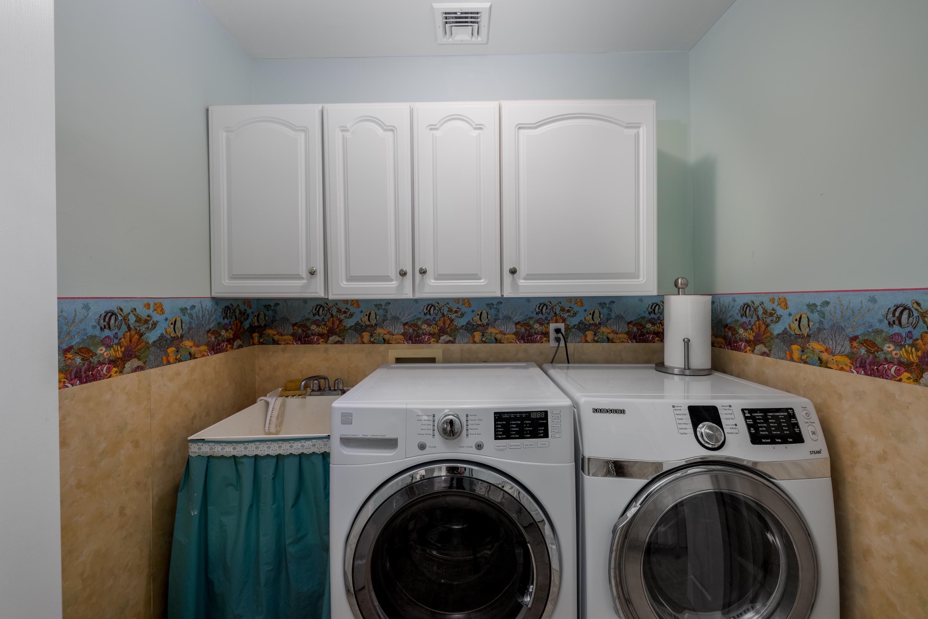 5 Adelphia Road Cape May, NJ 08204 - Photo 17 of 48 a view of a storage & utility room with a sink