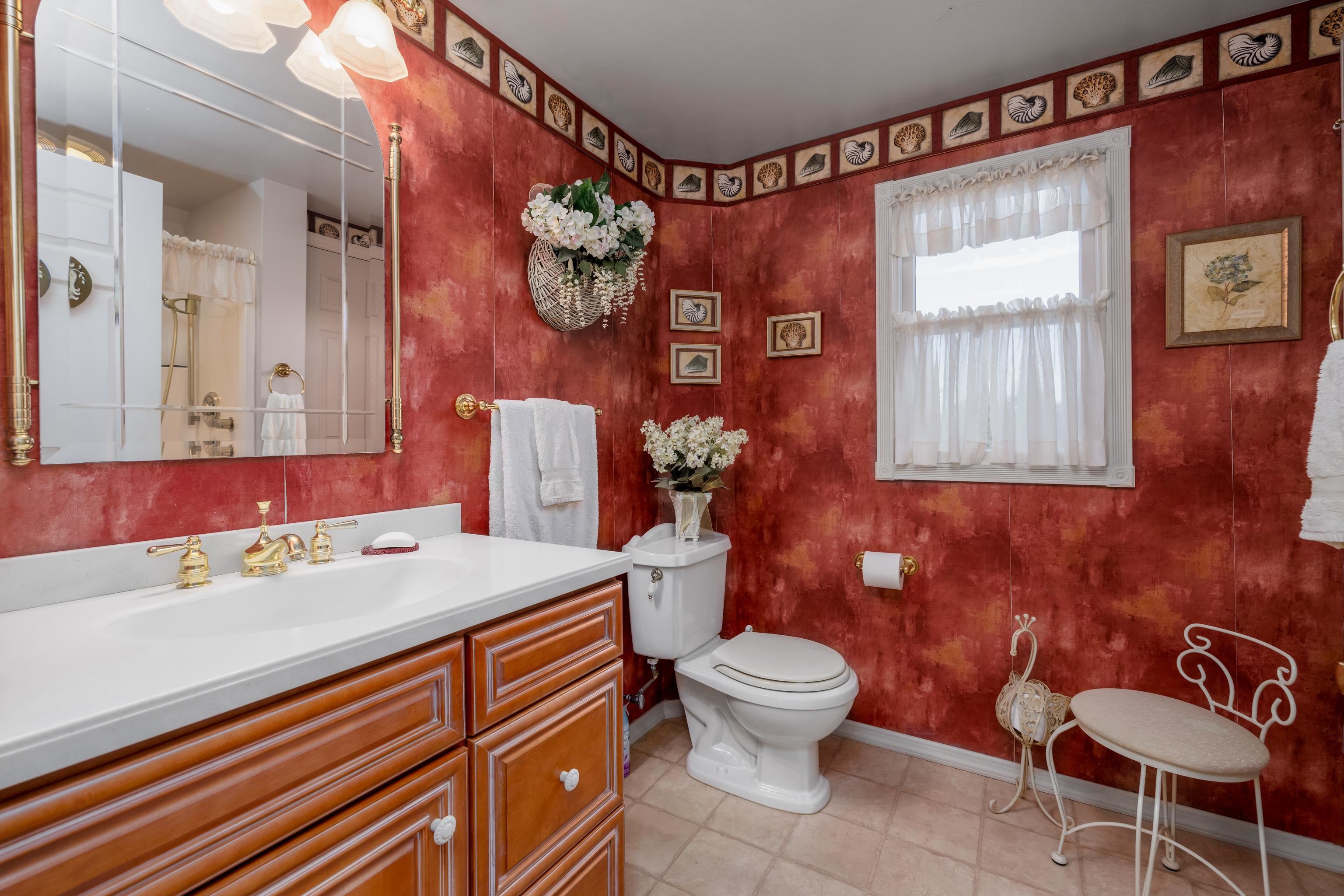 5 Adelphia Road Cape May, NJ 08204 - Photo 23 of 48 a bathroom with a sink toilet and mirror