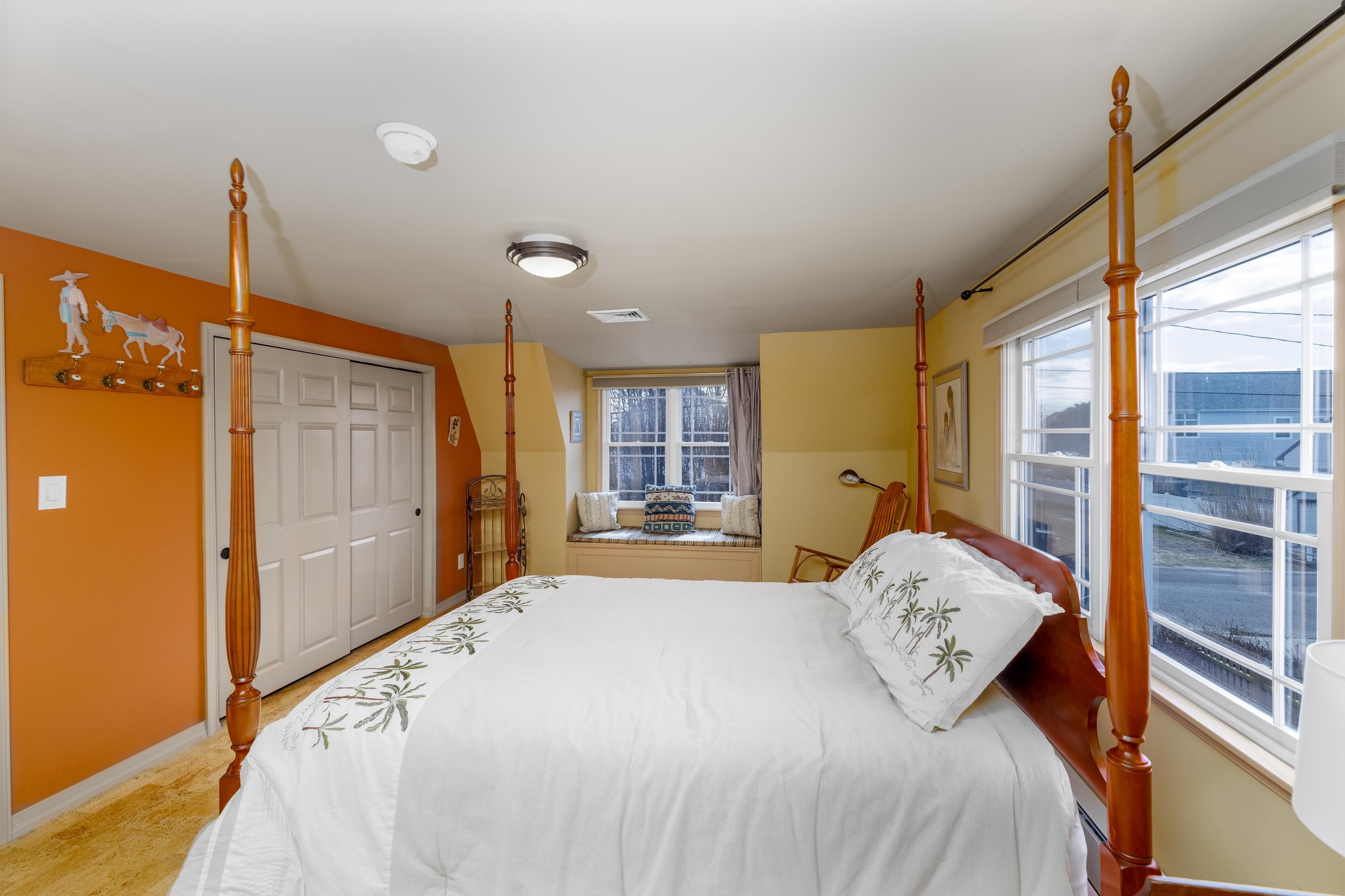 5 Adelphia Road Cape May, NJ 08204 - Photo 25 of 48 a bed sitting in a spacious bedroom next to a window