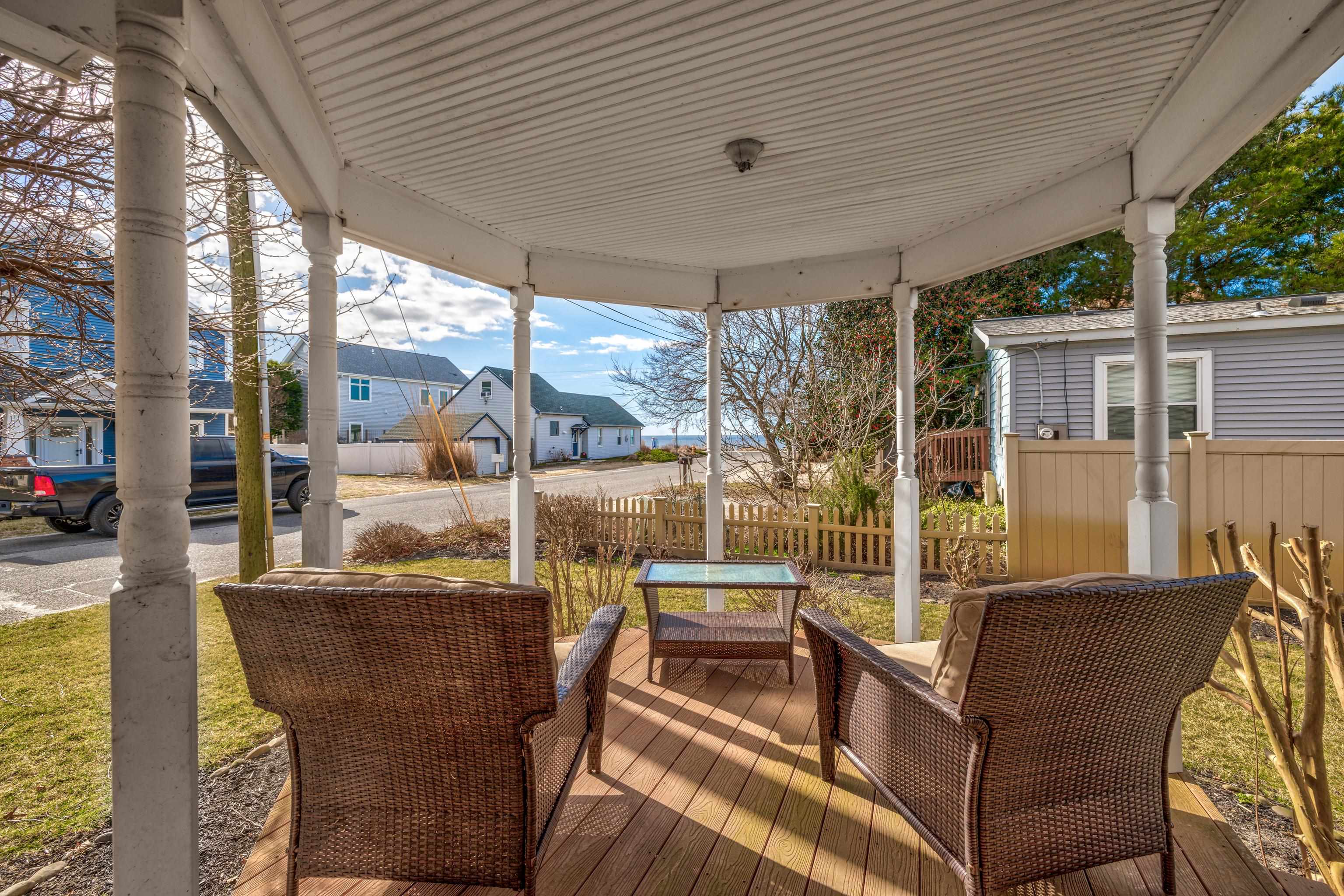 5 Adelphia Road Cape May, NJ 08204 - Photo 28 of 48 a outdoor living space with patio furniture and garden