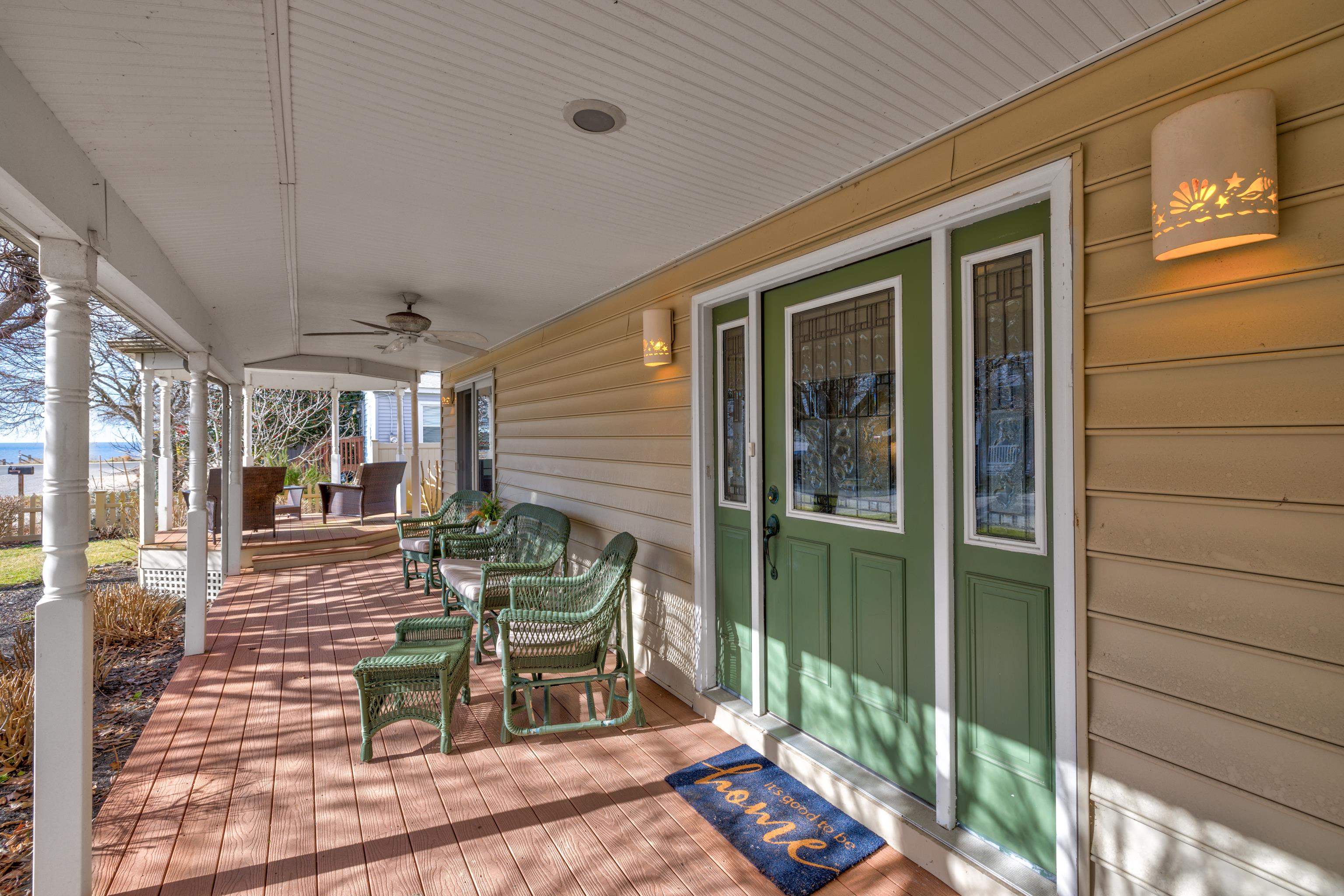 5 Adelphia Road Cape May, NJ 08204 - Photo 5 of 48 a view of a porch with chairs and backyard